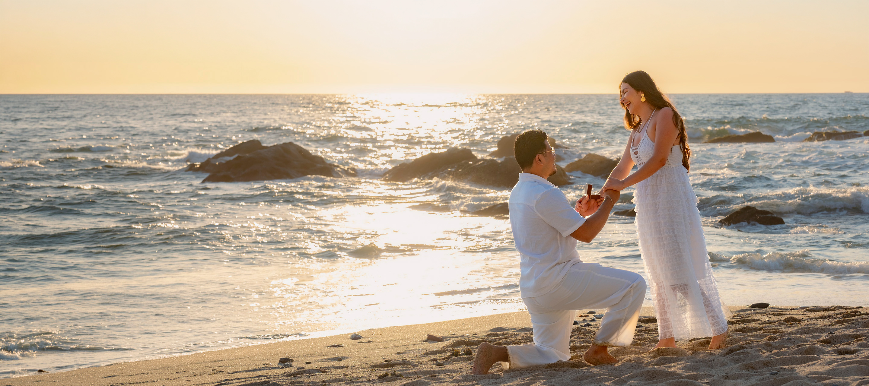 Marriage proposal on the beach at sunset in Puerto Vallarta